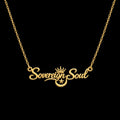 Sovereign Soul gold-toned nameplate necklace featuring script lettering, a crown, and a celestial star and moon charm.