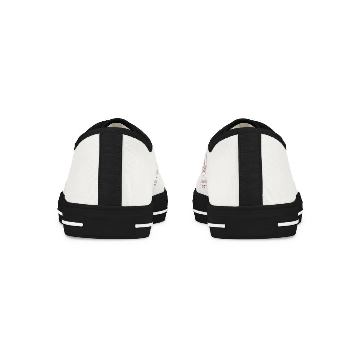 Sovereign Soul .Store white canvas low-top sneakers with black rubber outsoles viewed from the back