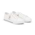 Sovereign Soul .Store white canvas low-top sneakers with a small maroon emblem on the side and silver metal eyelets.