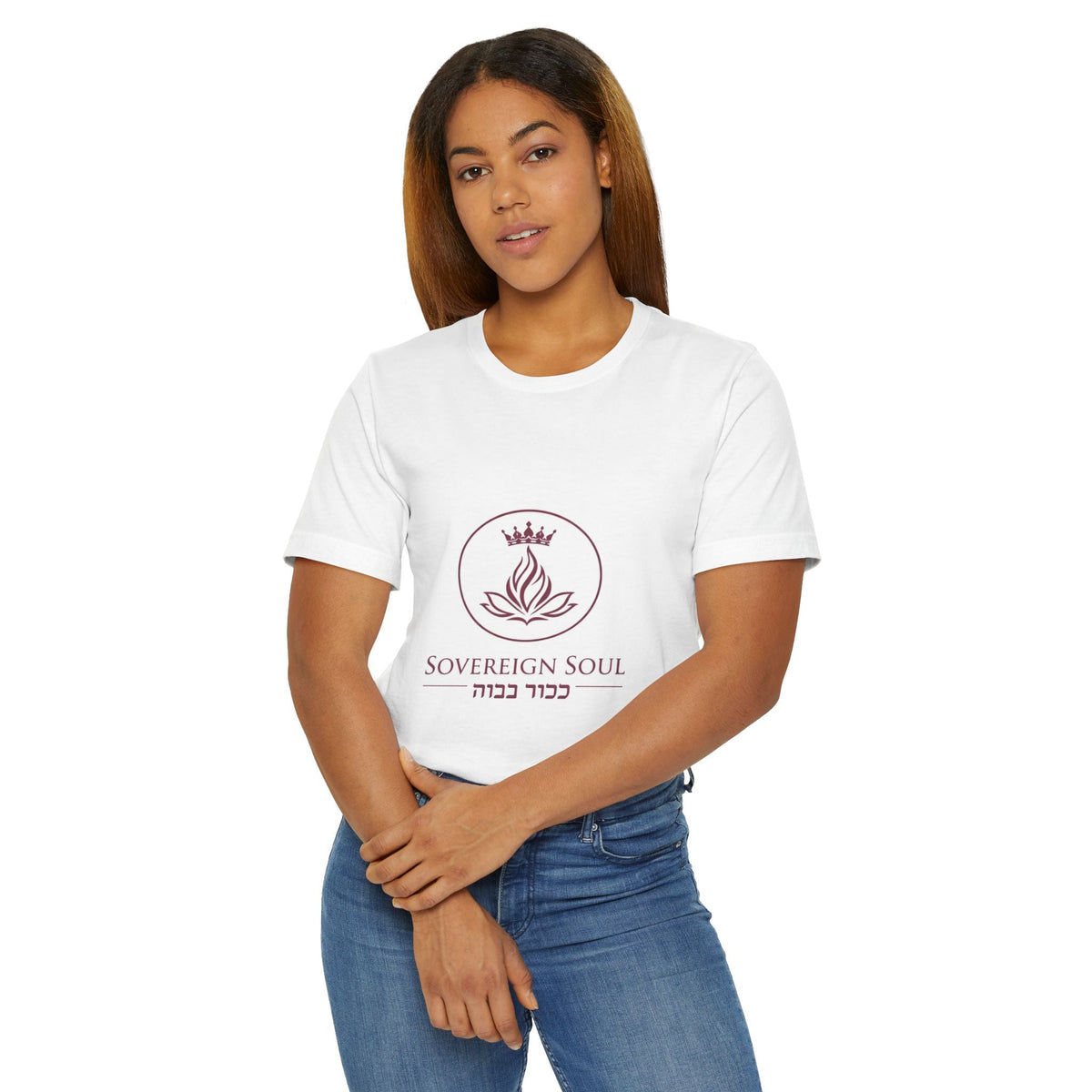 A woman wearing a white Sovereign Soul .Store cotton t-shirt featuring a crown and flame logo with Hebrew text.