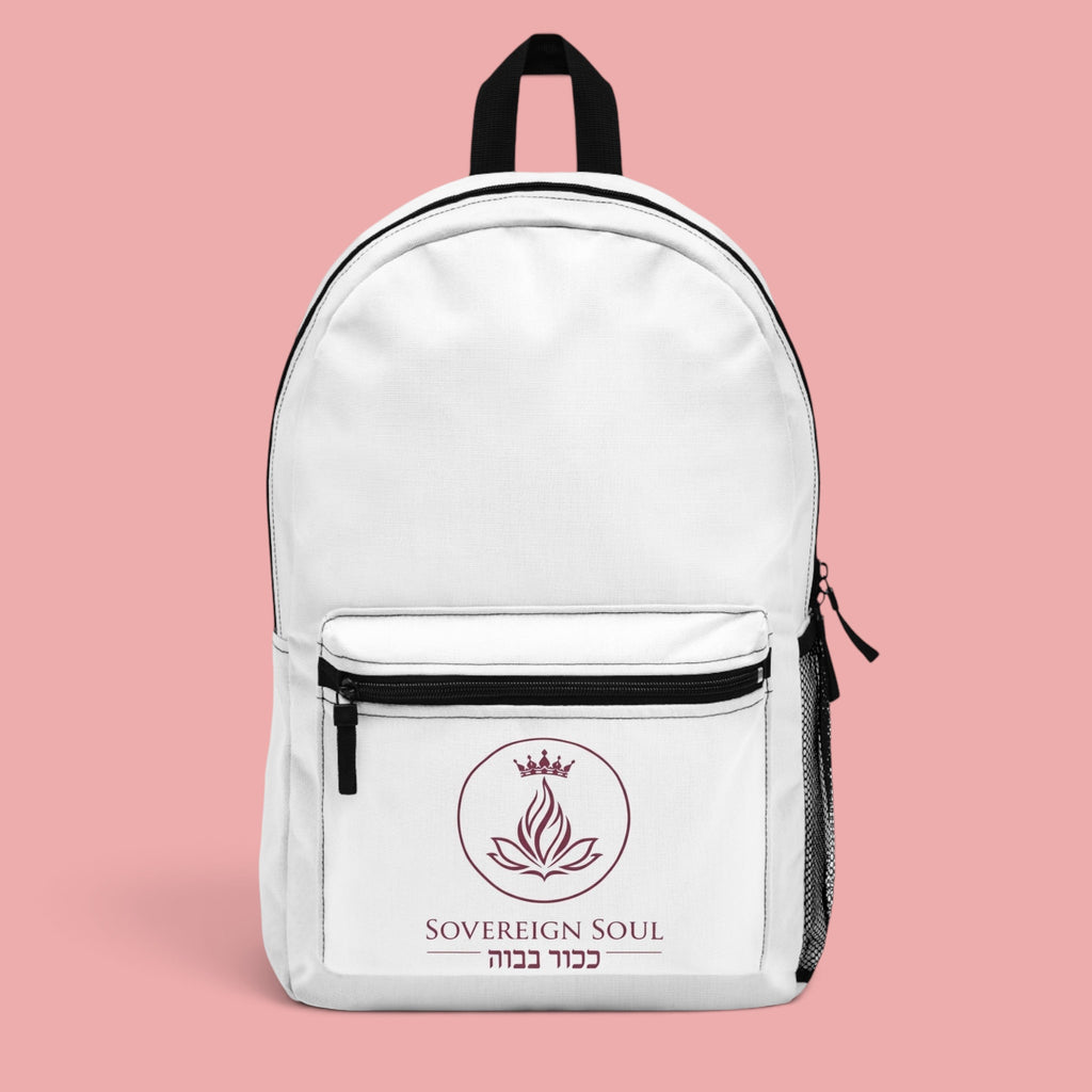Sovereign Soul .Store white everyday backpack with a lotus and crown emblem and Hebrew text on a pink background